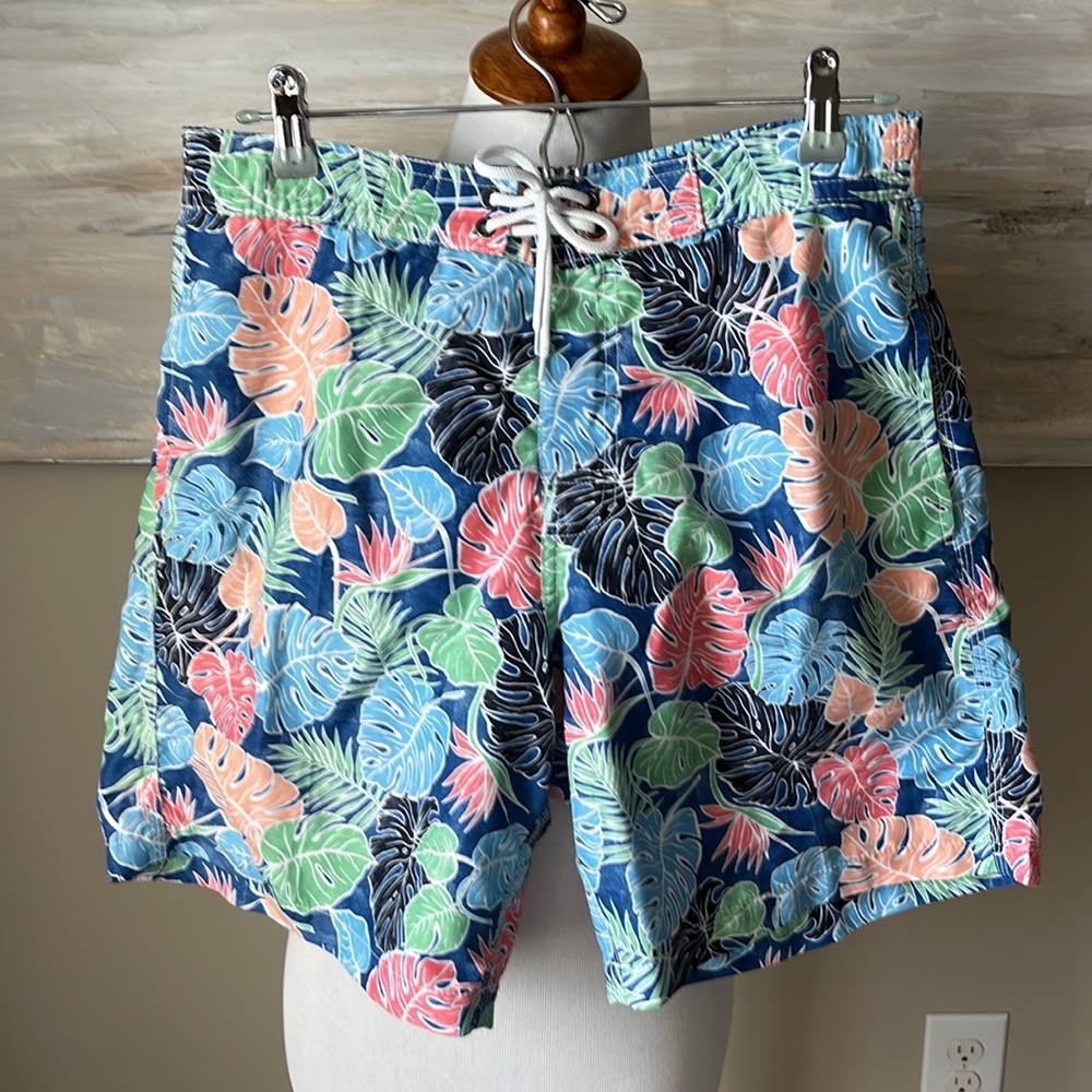 Trunks Surf & Swim Co. Tropical print swim trunks.
